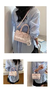 Pink polka dot Boston handbag with bow and lace detail, shown in multiple lifestyle views