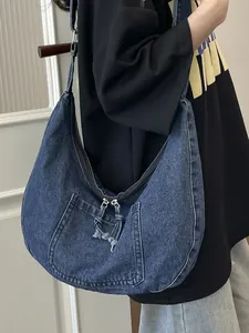 Large denim hobo bag for women with minimalist crossbody design for daily commute