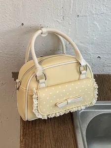 Sac à main bowling jaune vintage avec pois blancs, bordure en dentelle et nœud