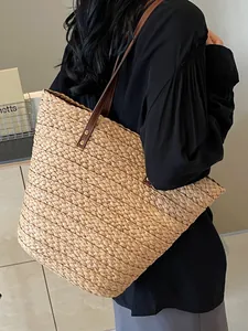 Sac à main élégant en paille tressée à la main pour les vacances d'été à la plage