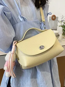 Stylish light yellow pebble leather crossbody small square bag for women with silver turn-lock