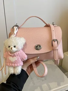 Stylish pink pebbled leather small square crossbody bag with cute bear charm