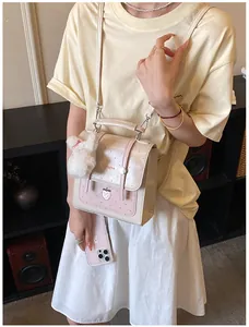 Stylish Korean-style beige and pink polka dot backpack with a cute strawberry design