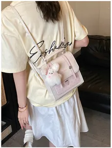 Detail view of Korean style polka dot backpack worn by a model with bunny charm