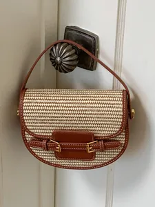 Vintage woven straw saddle bag for women stylish beach vacation handbag with leather trim