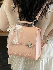 Zaino in pelle PU rosa da donna con ciondoli a stella e fiocco in pizzo decorativo