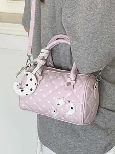 Sac Boston matelassé rose élégant avec pois blancs et breloques étoile et lune mignonnes