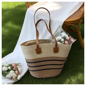 Handmade striped straw woven tote bag with brown leather handles for summer beach