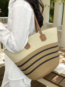 Large handmade woven straw tote bag with color-block stripes for summer beach vacations