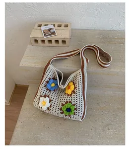Handmade crochet flower knit tote bag with striped shoulder strap for summer vacation