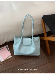 Large capacity minimalist light blue pleated tote bag made of soft vegan leather