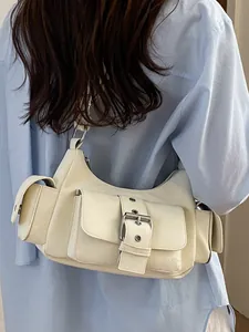 Chic beige multi-pocket armpit shoulder bag with trendy silver buckle details for women
