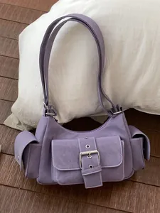 Trendy purple underarm shoulder bag featuring multiple utility pockets and silver buckle detail