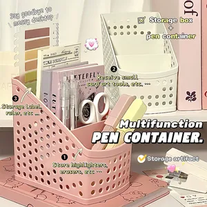 Detailed close-up view of a pink and white multi-compartment desk pen organizer set