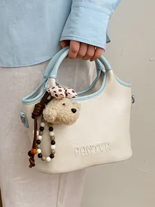 Élégant sac à main crème et bleu clair pour femme avec un joli ours en peluche inclus