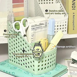 Macro view of multi-compartment mint green stationery organizer storing pens and scissors
