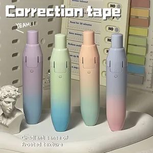 Detail view of macaron gradient correction tapes with frosted texture and push-button design.
