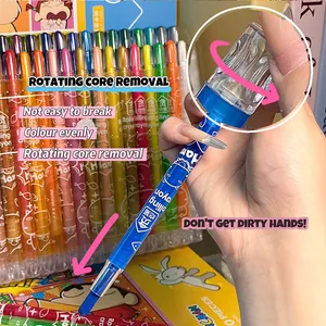 Close-up detail of a rotating blue crayon showing easy core removal feature for kids art