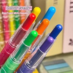 Detailed macro view of colorful rotary crayons featuring protective transparent barrels