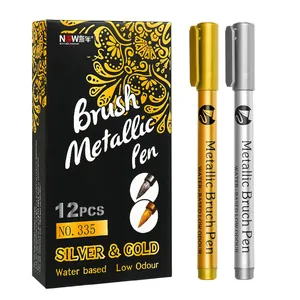 Detailed view of gold and silver metallic brush pens set with soft brush tips