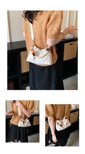 Petit sac bandoulière décontracté en nylon beige avec poignée en corde très colorée
