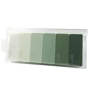 Detailweergave van 6 groene correctietapes met kleurverloop in een transparante etui