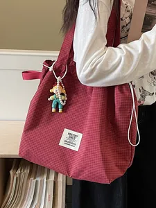 Large capacity red checkered canvas tote bag for women with a cute doll charm and patch.
