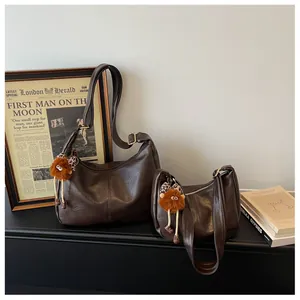 Large capacity brown PU leather tote and shoulder bag set with cute monster charms
