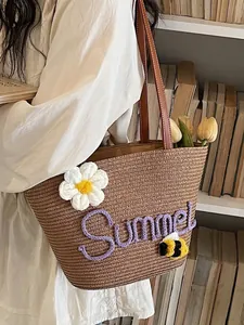 Woven straw beach tote bag with 'Summer' embroidery and floral accents