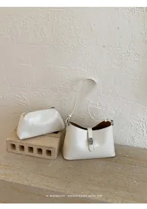Set di borsa a tracolla e pochette crema minimalista in stile retrò sofisticato