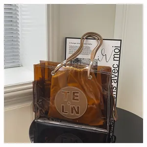 Große braune transparente PVC-Einkaufstasche mit modischer Innentasche und Nähten