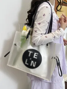 Modische transparente PVC-Einkaufstasche mit großem Fassungsvermögen für Damen.
