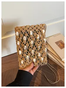 Bolso bandolera de paja tejido a mano con cuentas de mármol para las vacaciones de verano