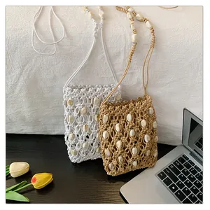 Bolsos bandolera tejidos para móvil con cuentas en blanco y beige para la playa