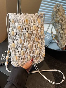 Bolso de teléfono de macramé hecho a mano con cuentas de ámbar para vacaciones