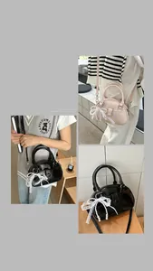 Detailed views of small luxury handbag featuring elegant lace and pearl decorative charms.
