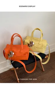 Large capacity trendy Boston tote bags in vibrant orange and yellow with wide straps