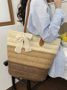 Sac cabas en paille tissé à la main pour femme avec un grand nœud en dentelle
