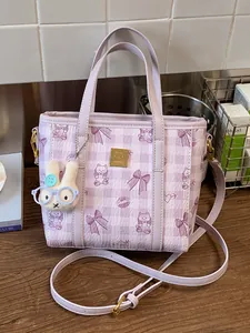 Stylish purple plaid women's handbag and crossbody bag featuring a cute rabbit charm