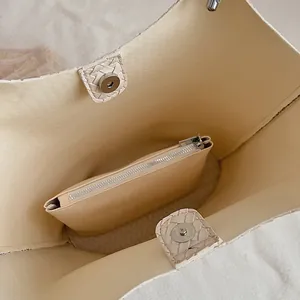 Interior view of large capacity vintage tote bag showing inner zipper pouch