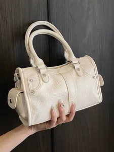 Elegant cream litchi grain handbag with top handles and silver stud details for women