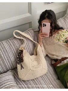 Elegant woven hollow crochet bag for beach vacations, vintage style women's shoulder bag
