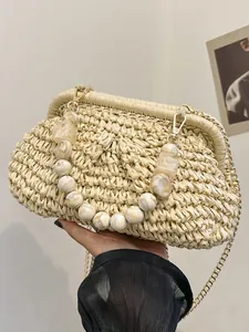 Vintage woven straw shell bag with beaded handle and gold chain strap for beach holidays