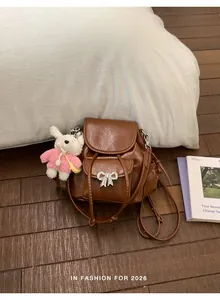 Stylish brown sweet girl faux leather backpack with cute rabbit keychain decor