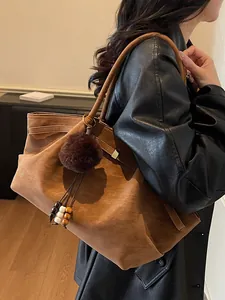 Retro pleated brown suede tote bag with fuzzy pom-pom charm, large capacity for commuting