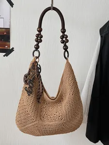 Handcrafted large capacity woven straw shoulder bag for beach vacations