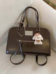 Vintage dark brown faux leather backpack for women with cute puppy charm and bow
