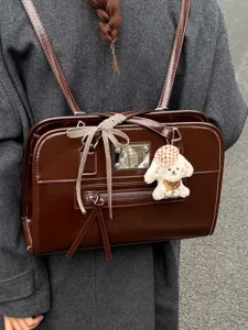 High-end brown faux leather backpack with cute puppy charm for school and commuting