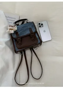 Mini zaino retrò in denim e pelle marrone con simpatico ciondolo a forma di orsetto