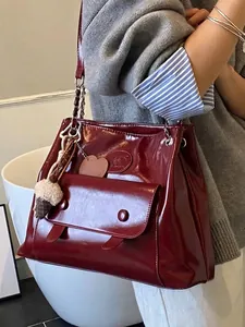 Vintage burgundy faux leather tote bag with large capacity and glossy finish